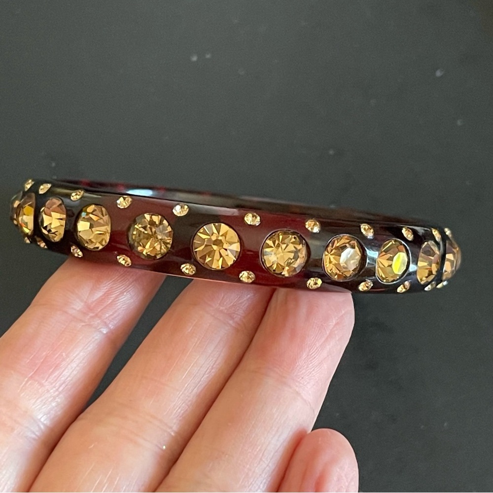 Vintage rhinestone encrusted lucite bangle.
